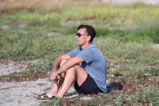 Man sitting and breathing